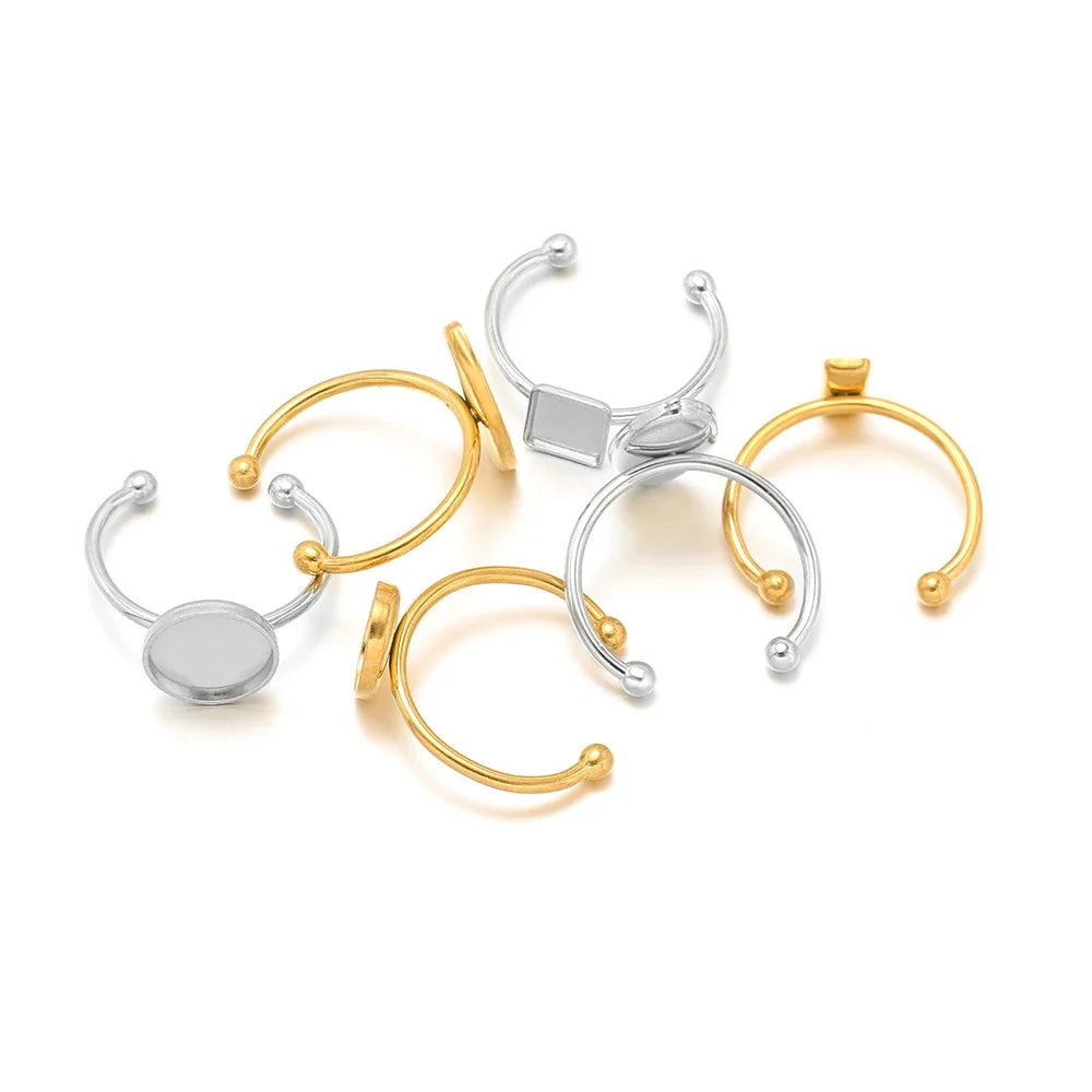 Mixed gold and silver open cabochon ring settings with round blank tray and beaded prongs