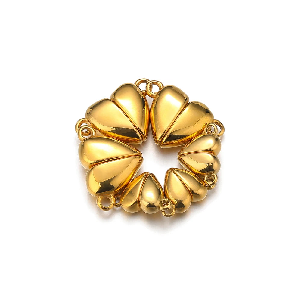 Gold heart-shaped magnetic clasp connector, curved split design with connector loops.