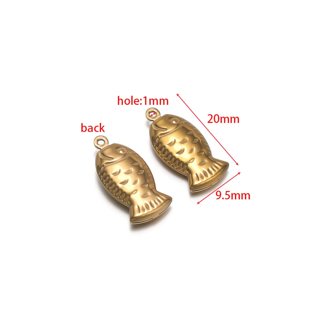 Gold fish-shaped stainless steel hollow charm with round loop, for DIY ocean jewelry