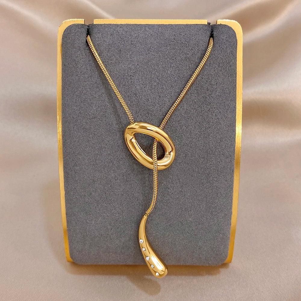 Gold knot and waterdrop pendant necklace with snake chain and small rhinestones