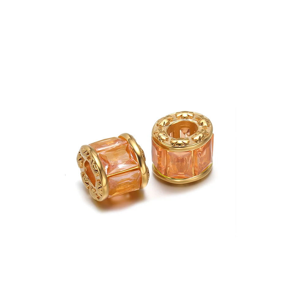 Gold-plated spacer beads with peach-orange and clear-pink crystal finishes