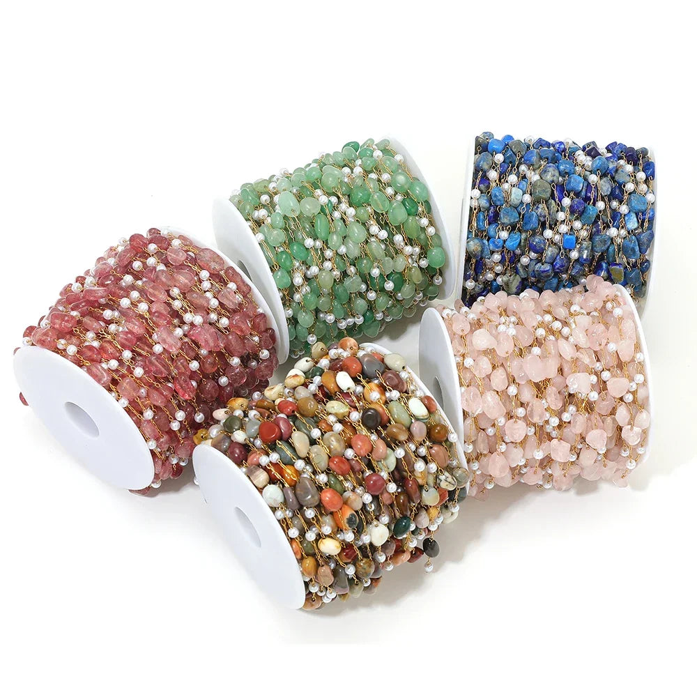 Irregular stone bead chain on gold-toned links with pearl accents, multicolor rolls