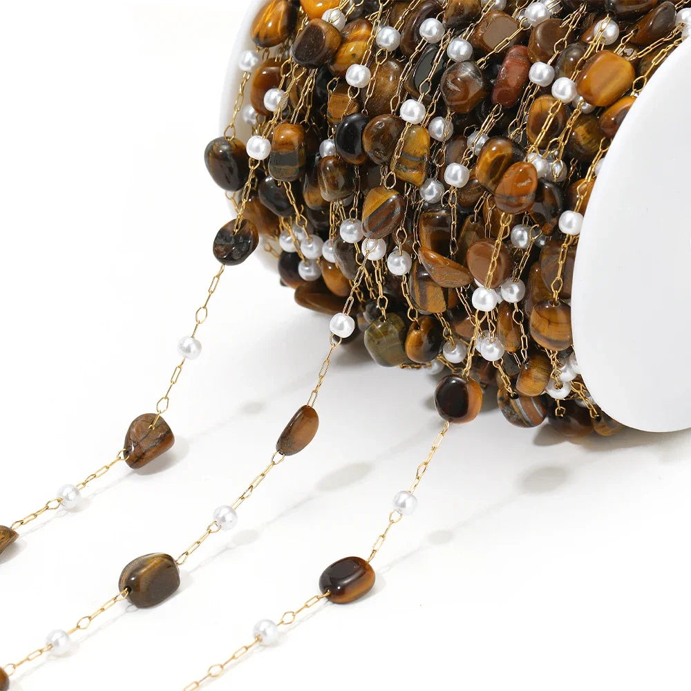 Irregular brown stone bead chain with white pearl drops and gold-link connectors