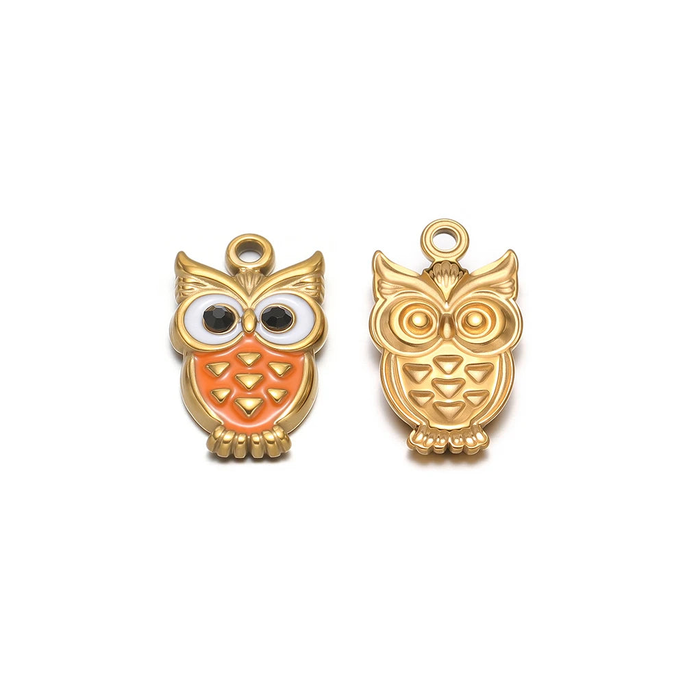 Gold-tone enamel owl charms, two pendants: one with orange belly, one mostly plain gold