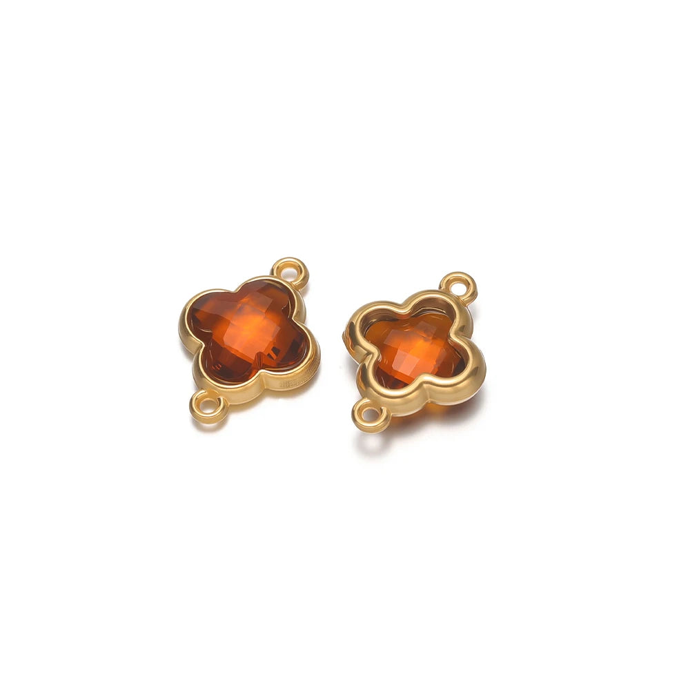 Four-leaf clover glass charm pendant in amber with gold-tone loops, for DIY jewelry