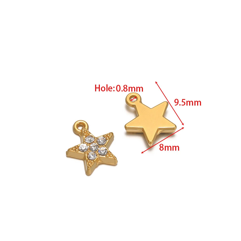 Gold-tone star charm pendants with rhinestones and hanging loops, small round hole
