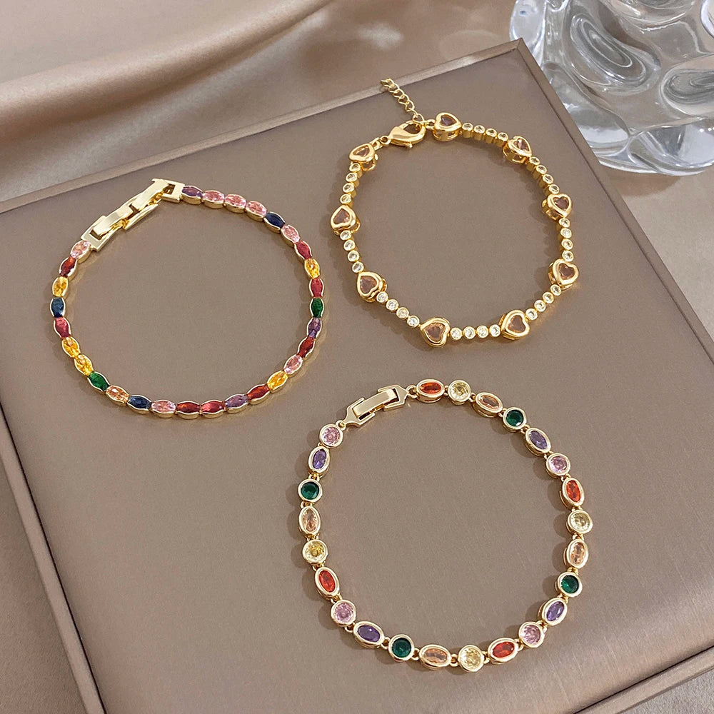 Gold-plated chain bracelet with multicolor oval zircon beads and toggle clasp