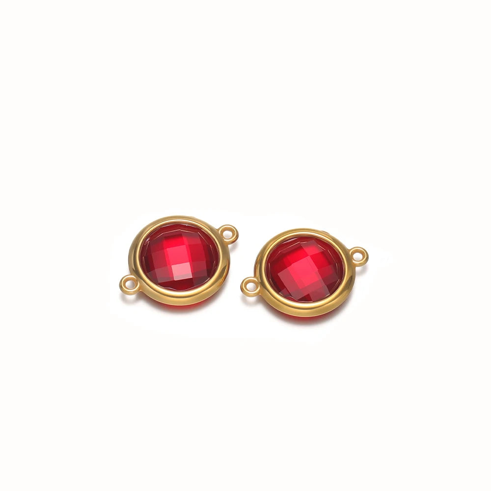 Round faceted glass charm pair in red with gold-tone metal loops