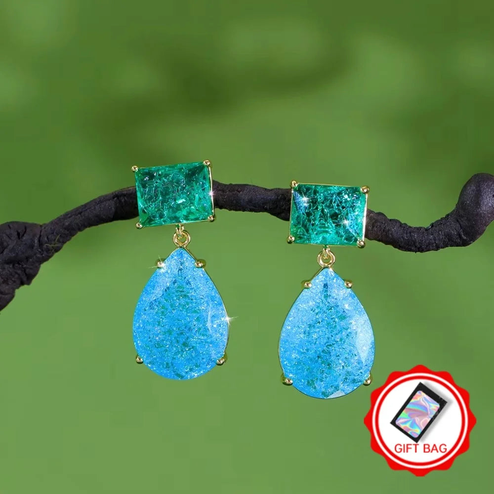 Pair of sparkling green square and blue teardrop drop earrings