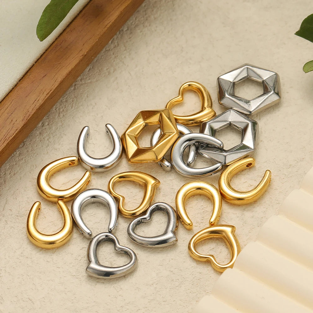 Assorted gold and silver heart U charms and hexagon pendants, stainless steel