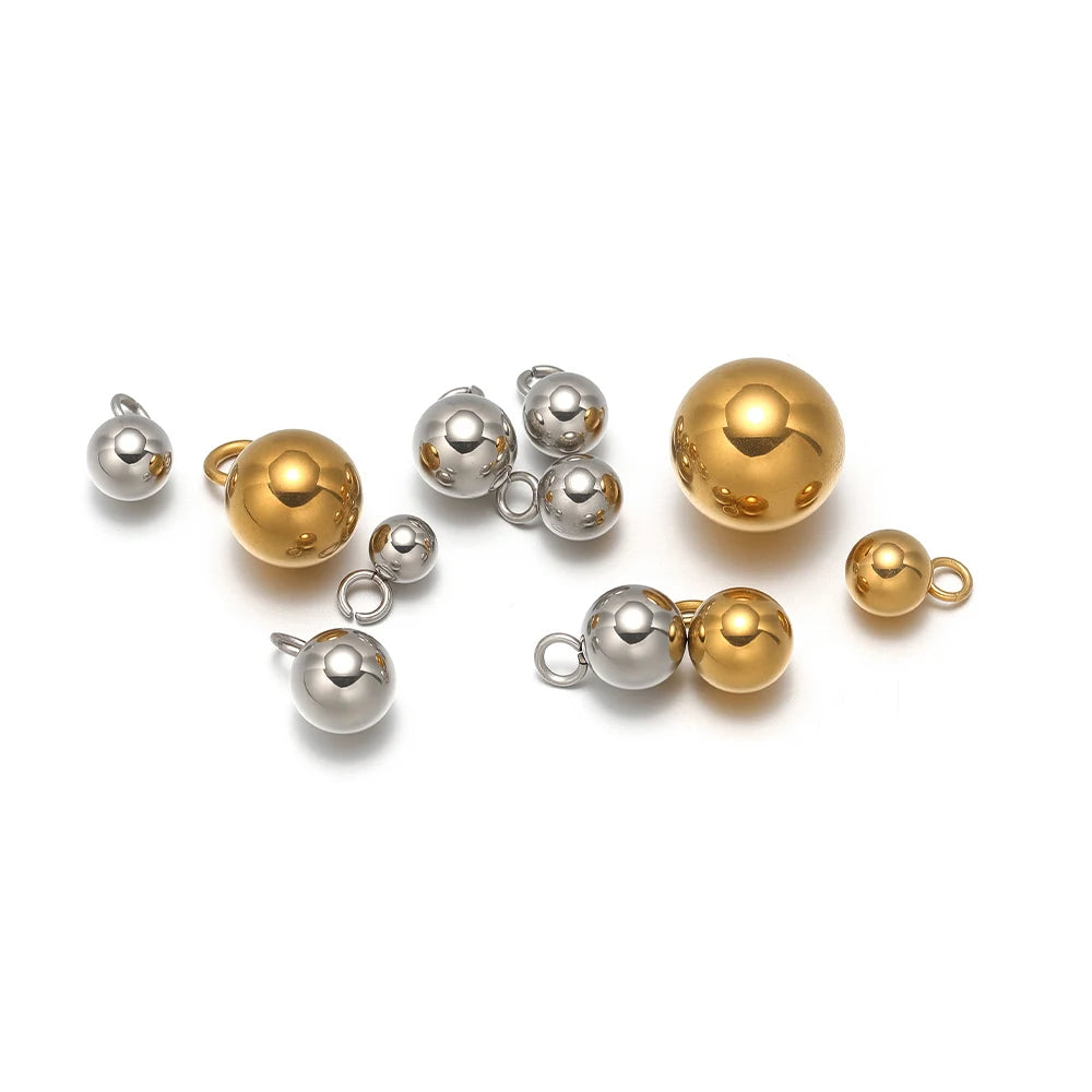 Silver and gold plated ball charms with loop rings, solid spherical pendant beads
