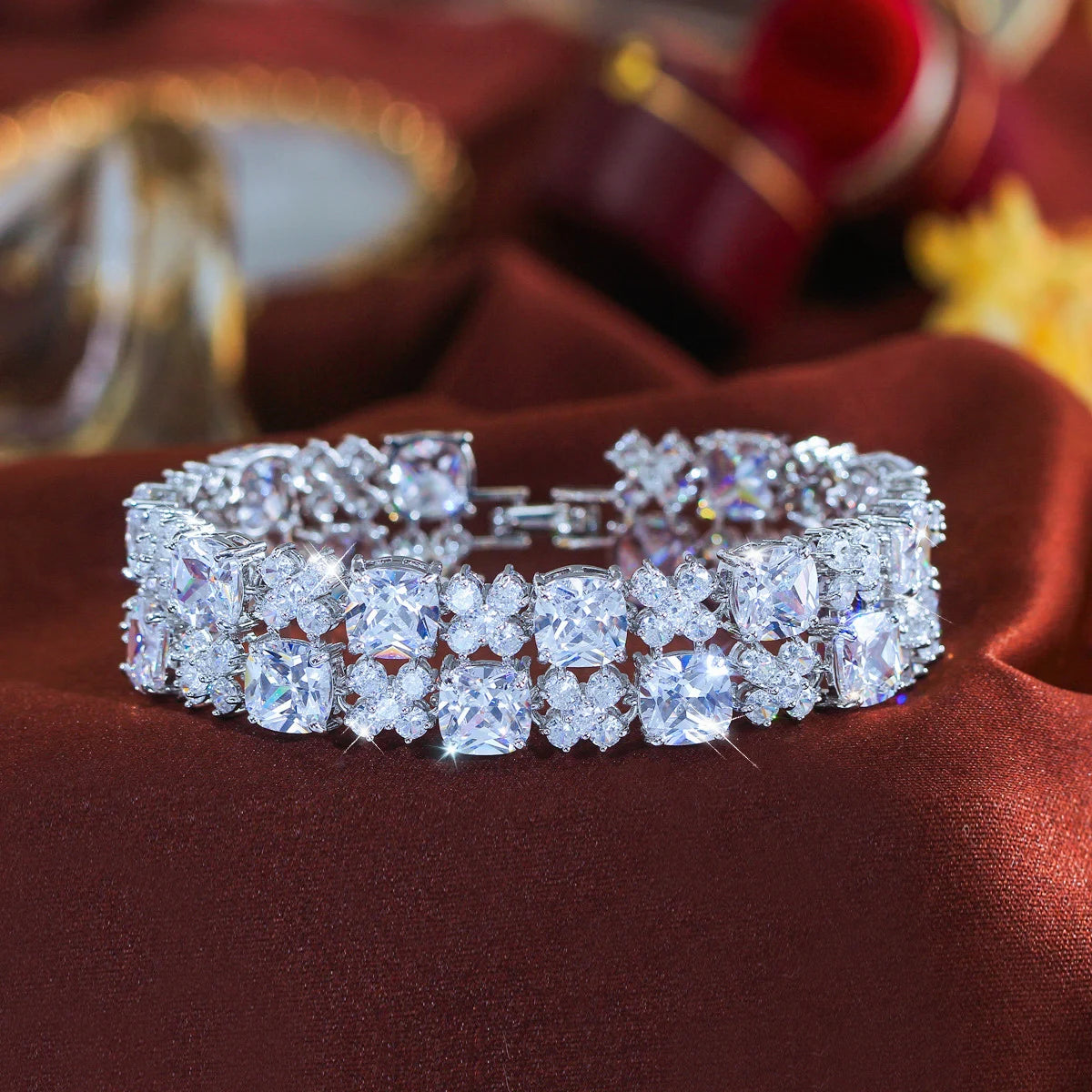 Clear cubic zirconia flower tennis bracelet with a silver-tone setting