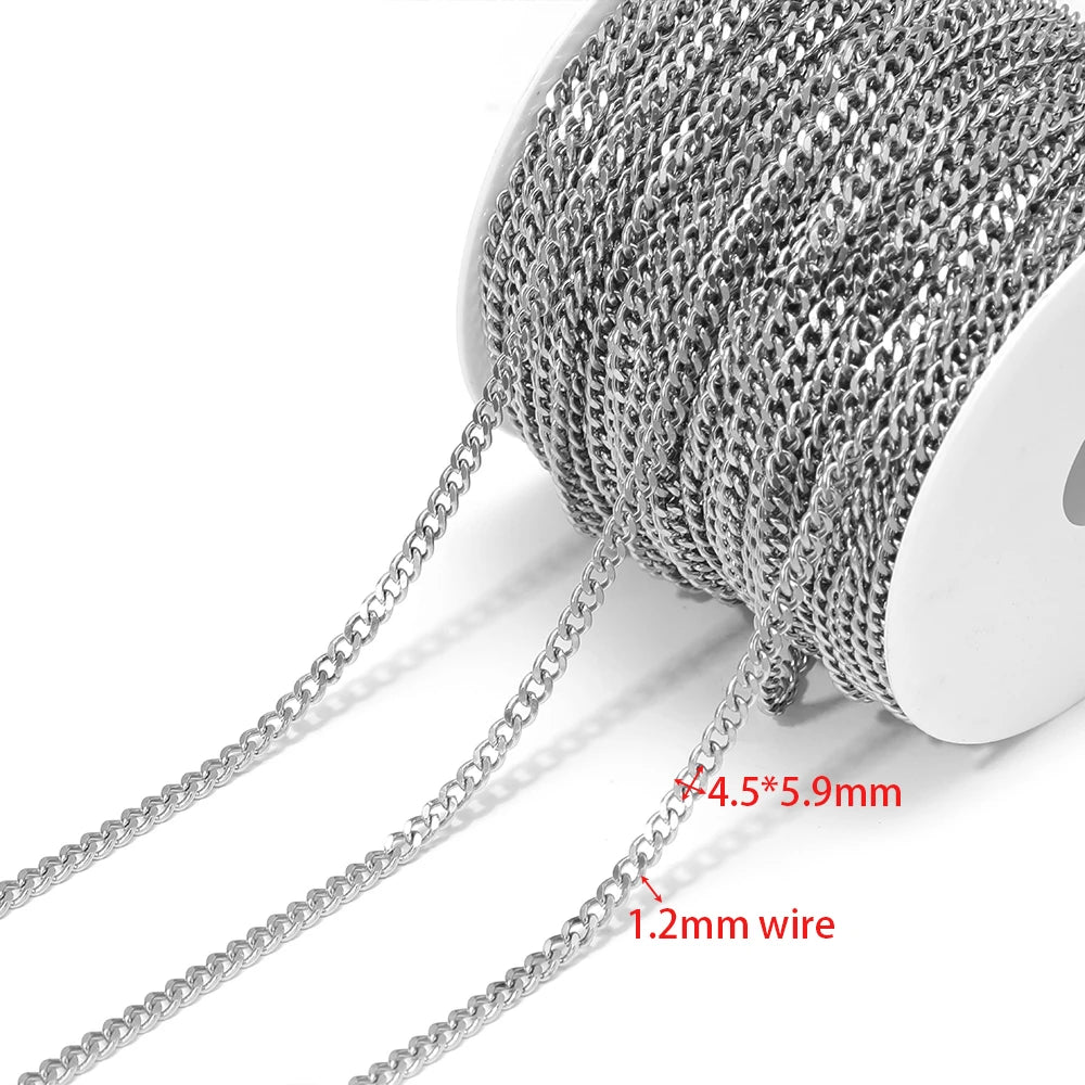 Steel Cuban link chain on a spool, close-up of interlocking links
