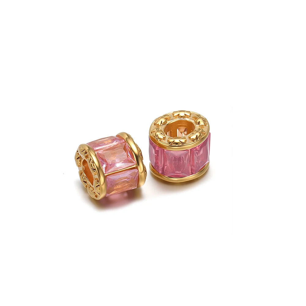 Gold-plated spacer beads with pink crystal cylinder and openwork ends