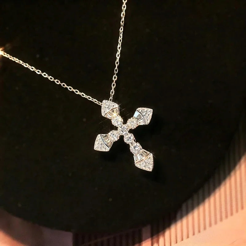 Silver-tone crystal cross pendant necklace on a delicate chain
