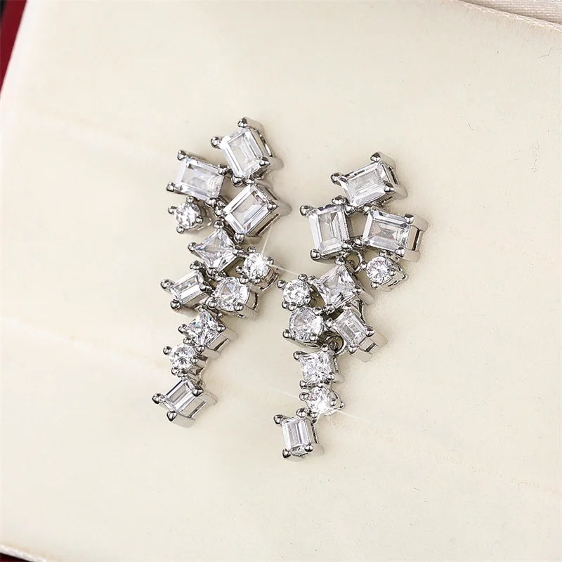 Geometric cubic zircon dangle earrings with rectangular stones and round accents