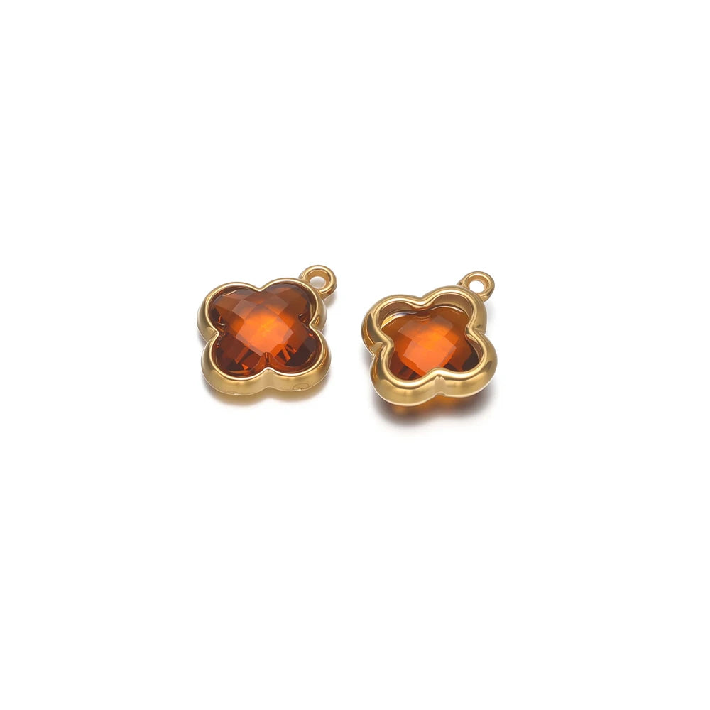 Gold-tone four-leaf clover glass pendant charm connector, amber orange