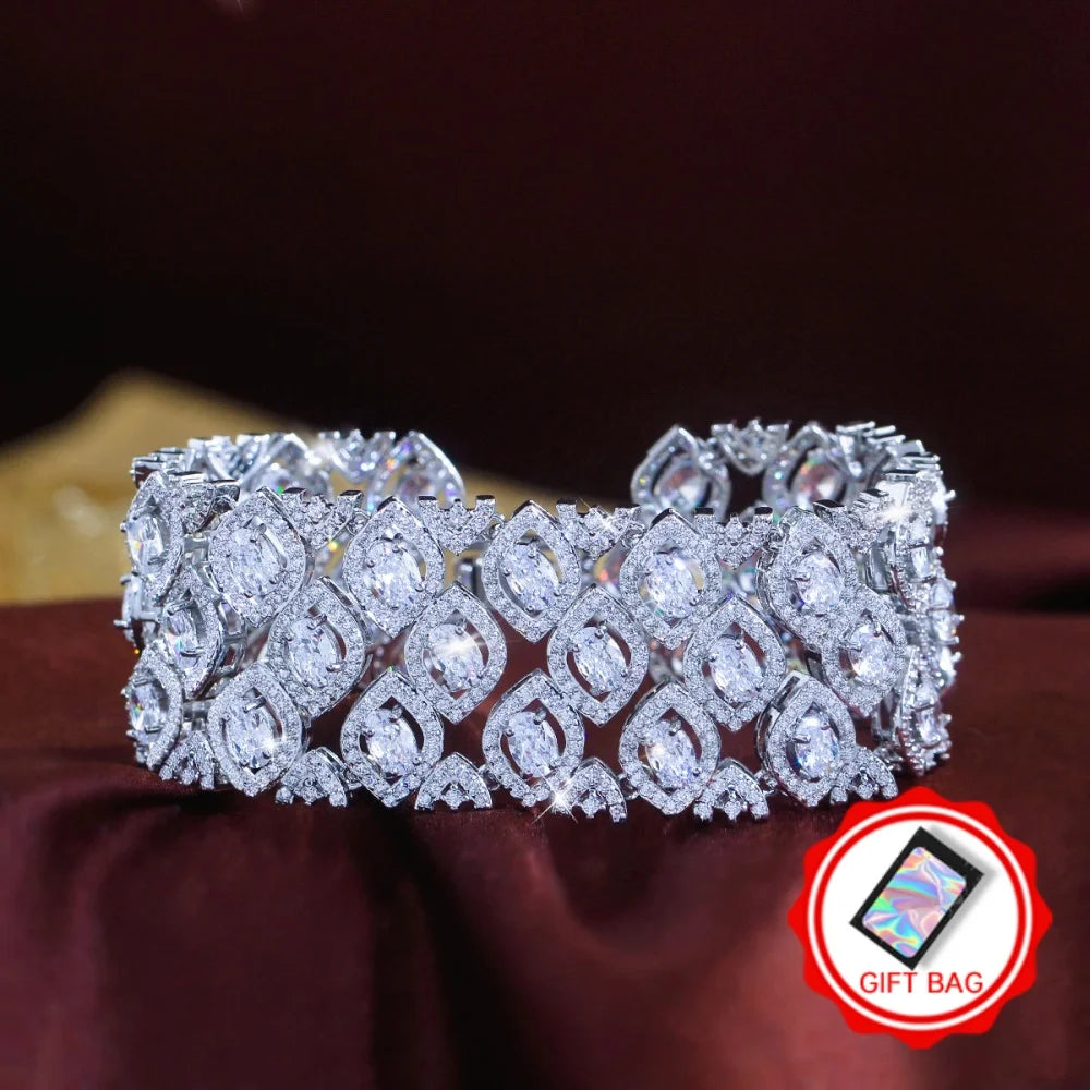 Wide silver-tone bracelet with rows of clear marquise-cut zirconia stones