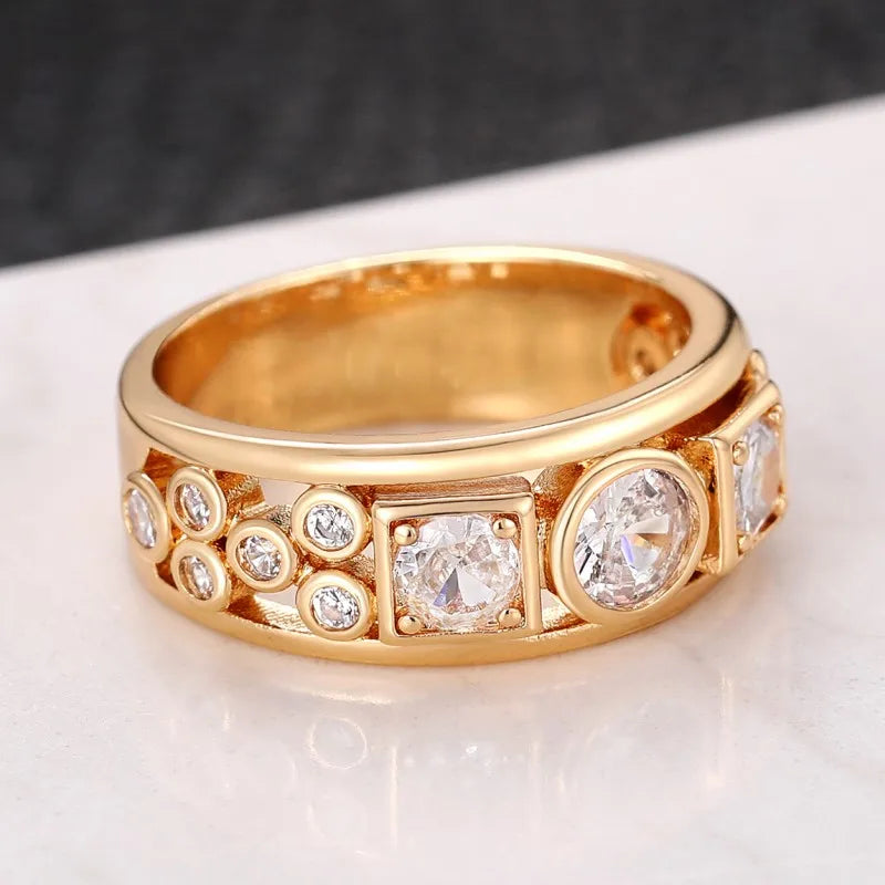 Gold-tone band ring with square CZ center and round clear stones
