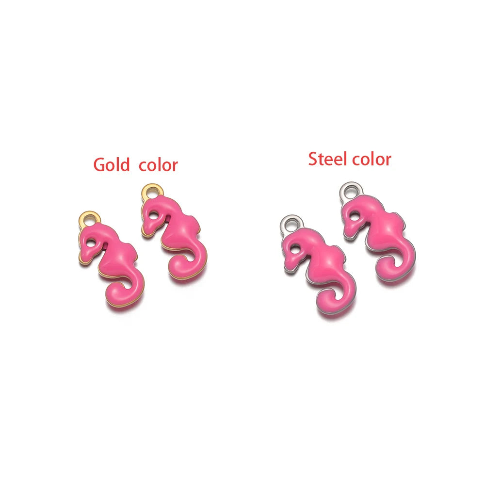 Pink seahorse-shaped charm set with loop, gold-tone and silver-tone finishes.
