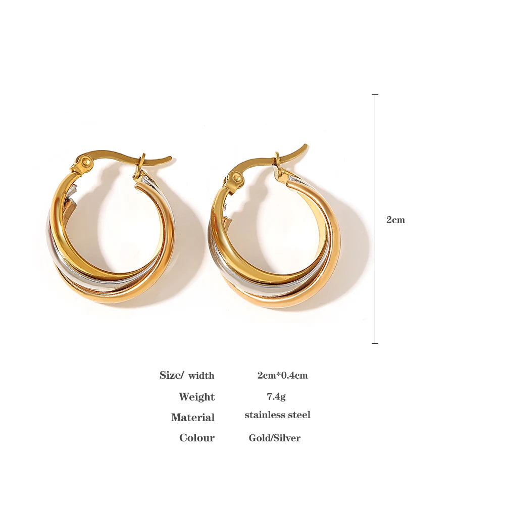 Twisted hoop earrings with gold and silver bands, shown beside a 2 cm size guide