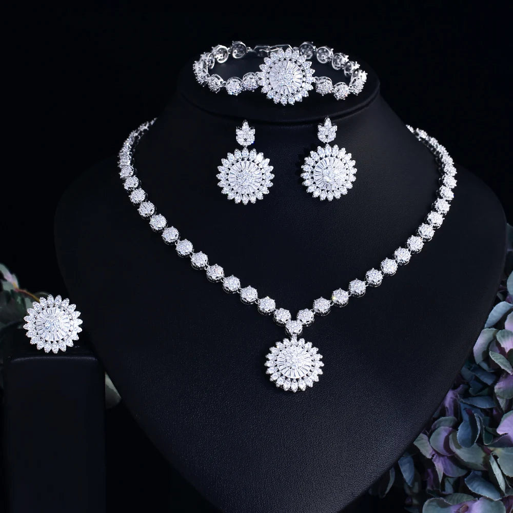 Sunflower zirconia jewelry set on bust: rhinestone necklace, round stud earrings, bracelet.
