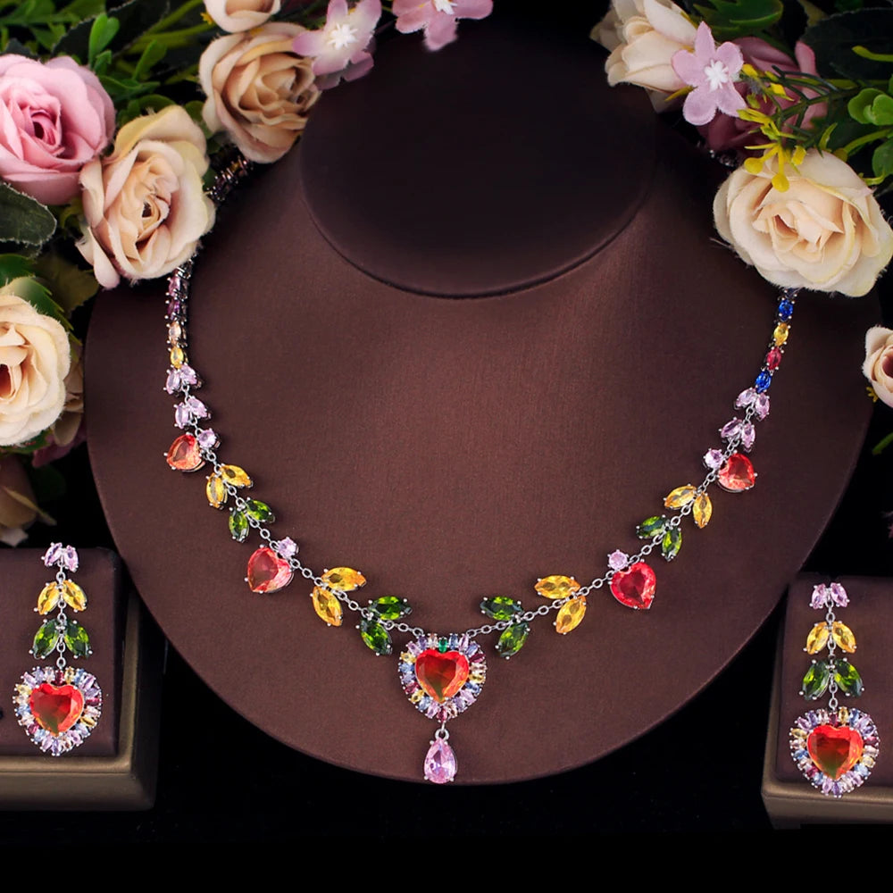 Heart zircon necklace with matching drop earrings, featuring red, yellow, green, and pink stones