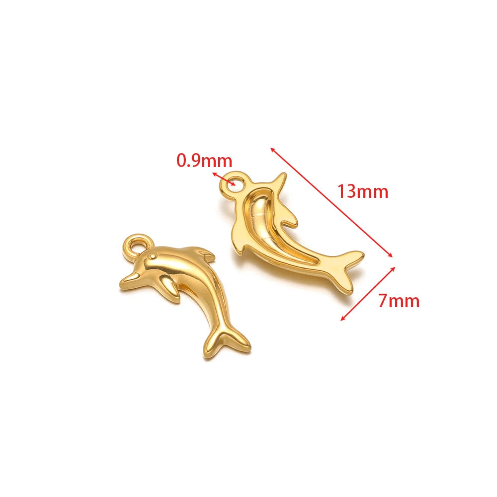 Stainless steel animal charm pendants set, dolphin shaped with gold-tone finish and small loops