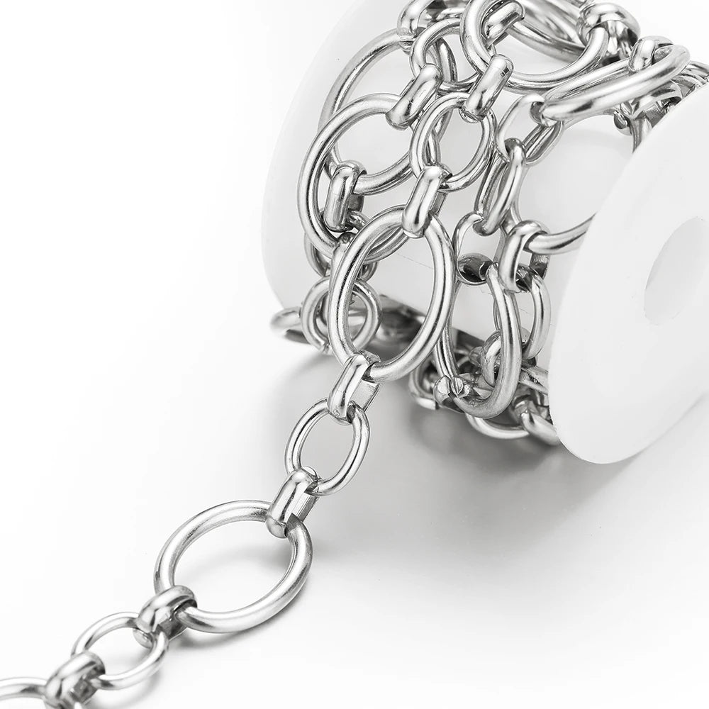 Stainless steel chain with rounded oval links and jump-ring details on a holder