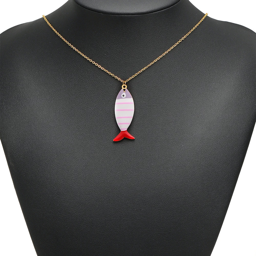 Gold chain necklace with pink striped fish enamel pendant and red tail