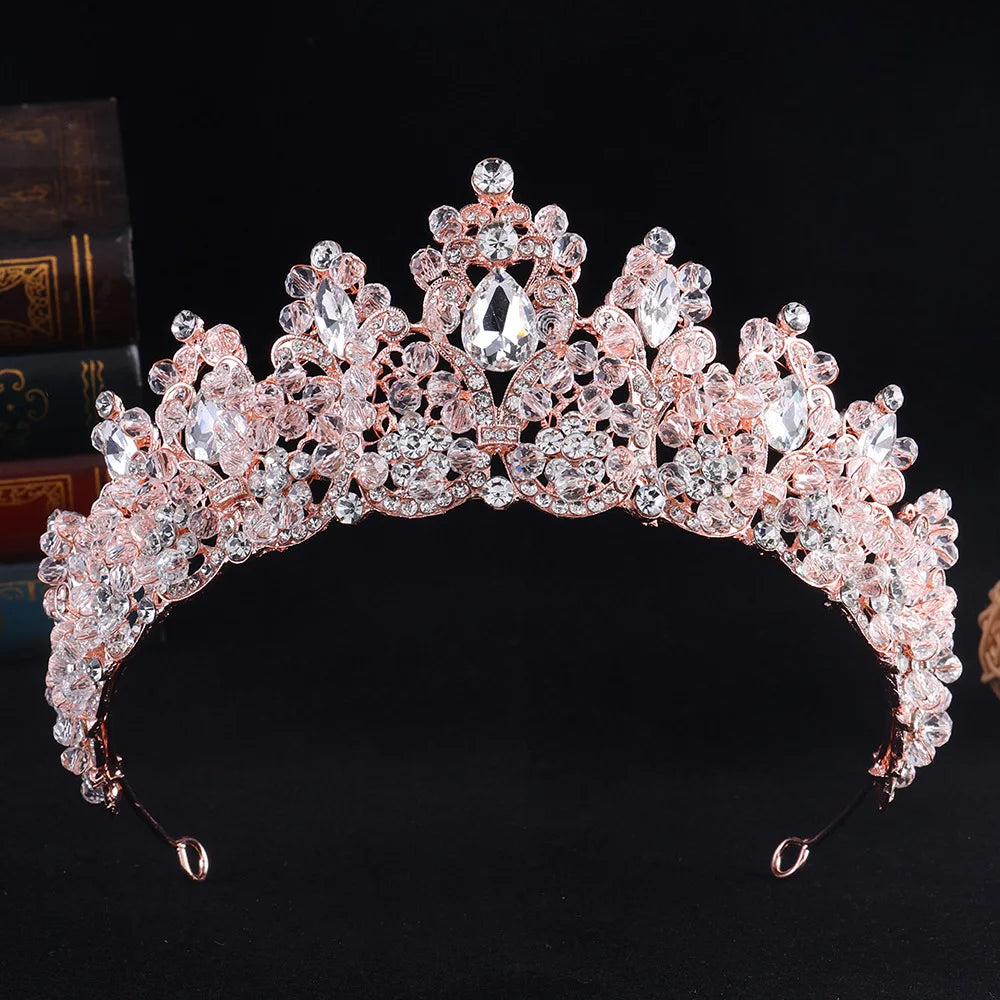 Rose gold crystal tiara crown with pink-toned stones and central oval centerpiece