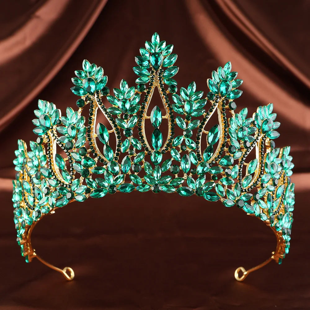 Turquoise rhinestone tiara with leaf-like crown accents and curved headband