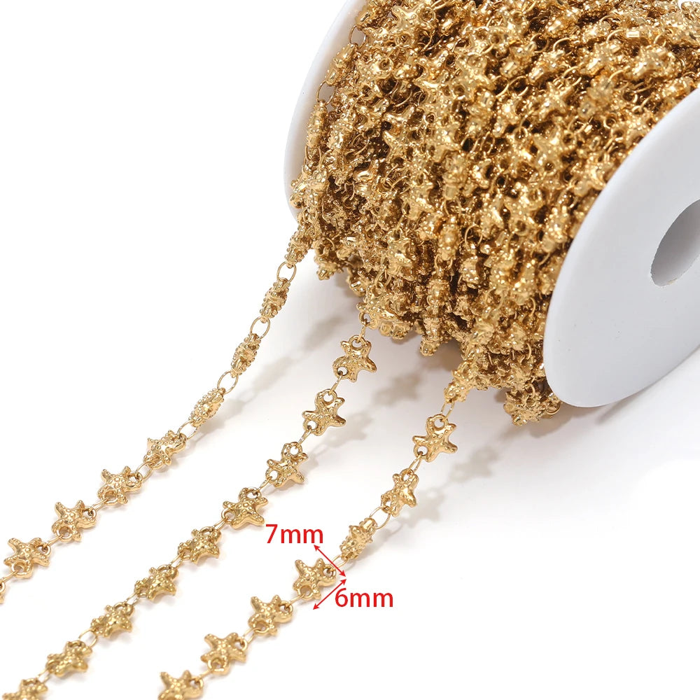 Gold-tone starfish charm chain with oval links, approx 7mm and 6mm spacing