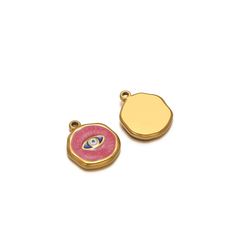 Two gold-tone enamel charms: pink evil eye and plain gold heart back