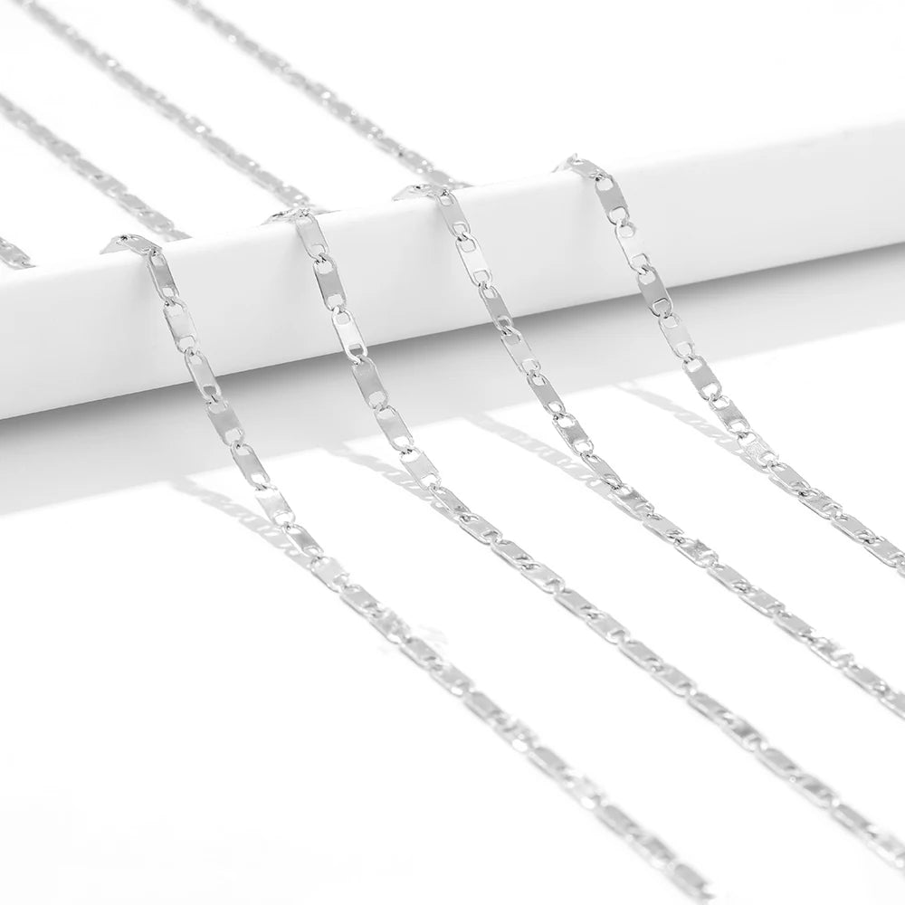 Silver flat link chain close-up with repeating link pattern for DIY jewelry