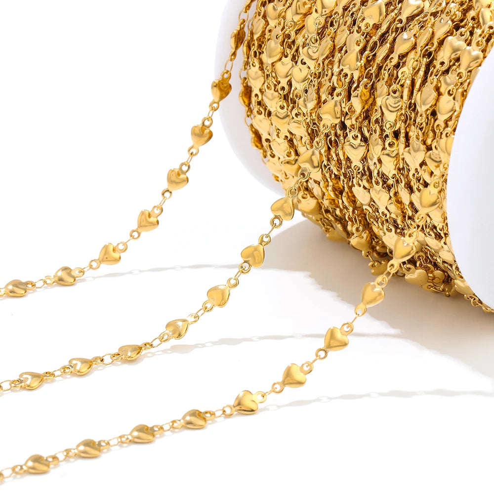 Gold heart chain by-the-meter, small linked hearts on a flexible chain length