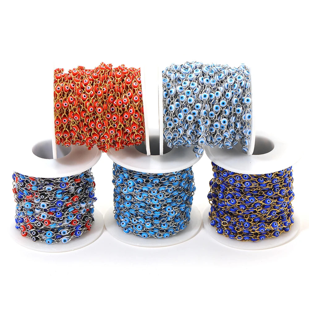 Evil eye bead chain bulk rolls in red, light blue, and dark blue on link strands