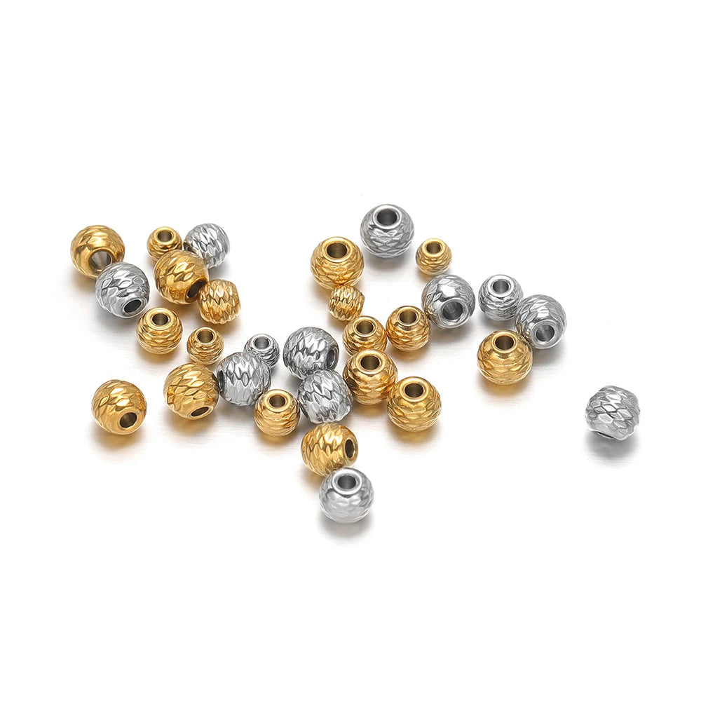 Assorted striped cut flower spacer beads with central hole in gold and silver tones