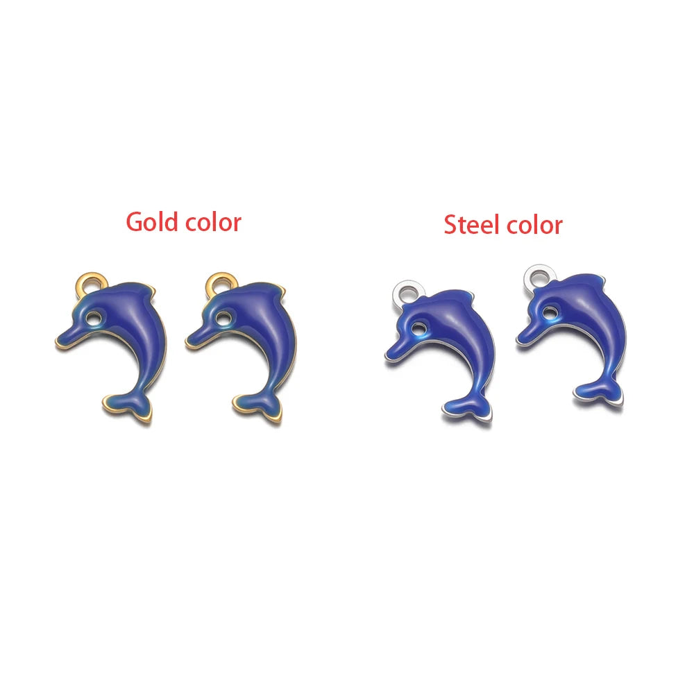 Blue dolphin pendant charm with gold-tone loop, marine animal jewelry finding