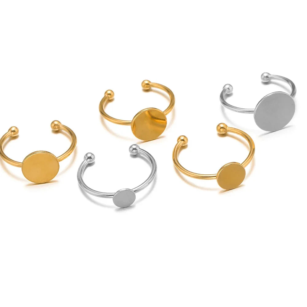 Gold and silver ring settings with round cabochon bezel discs and ball posts
