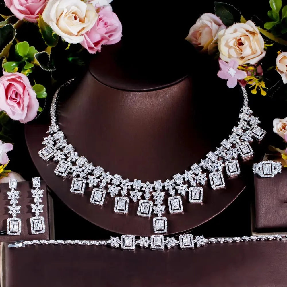 Rhinestone statement necklace with square links and dangling bar earrings, silver-toned