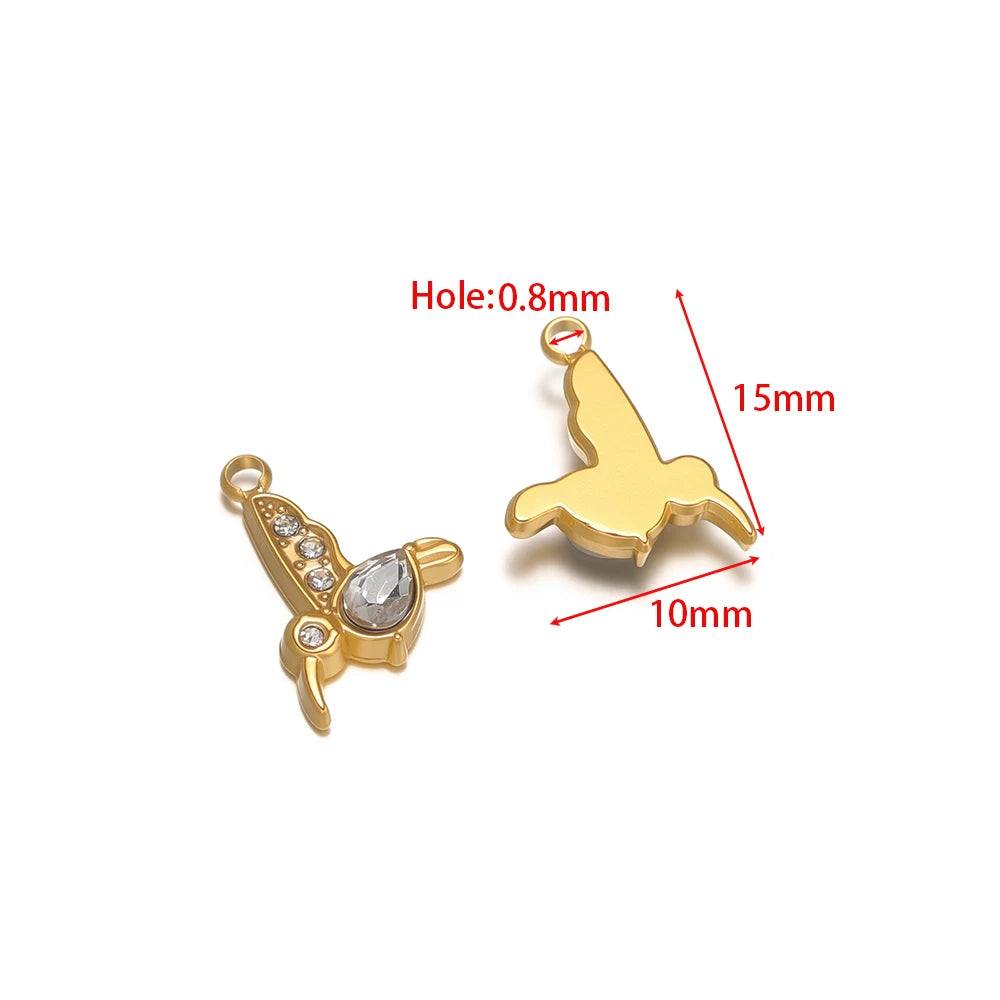 Gold-tone bird charms with red enamel accents and clear rhinestones