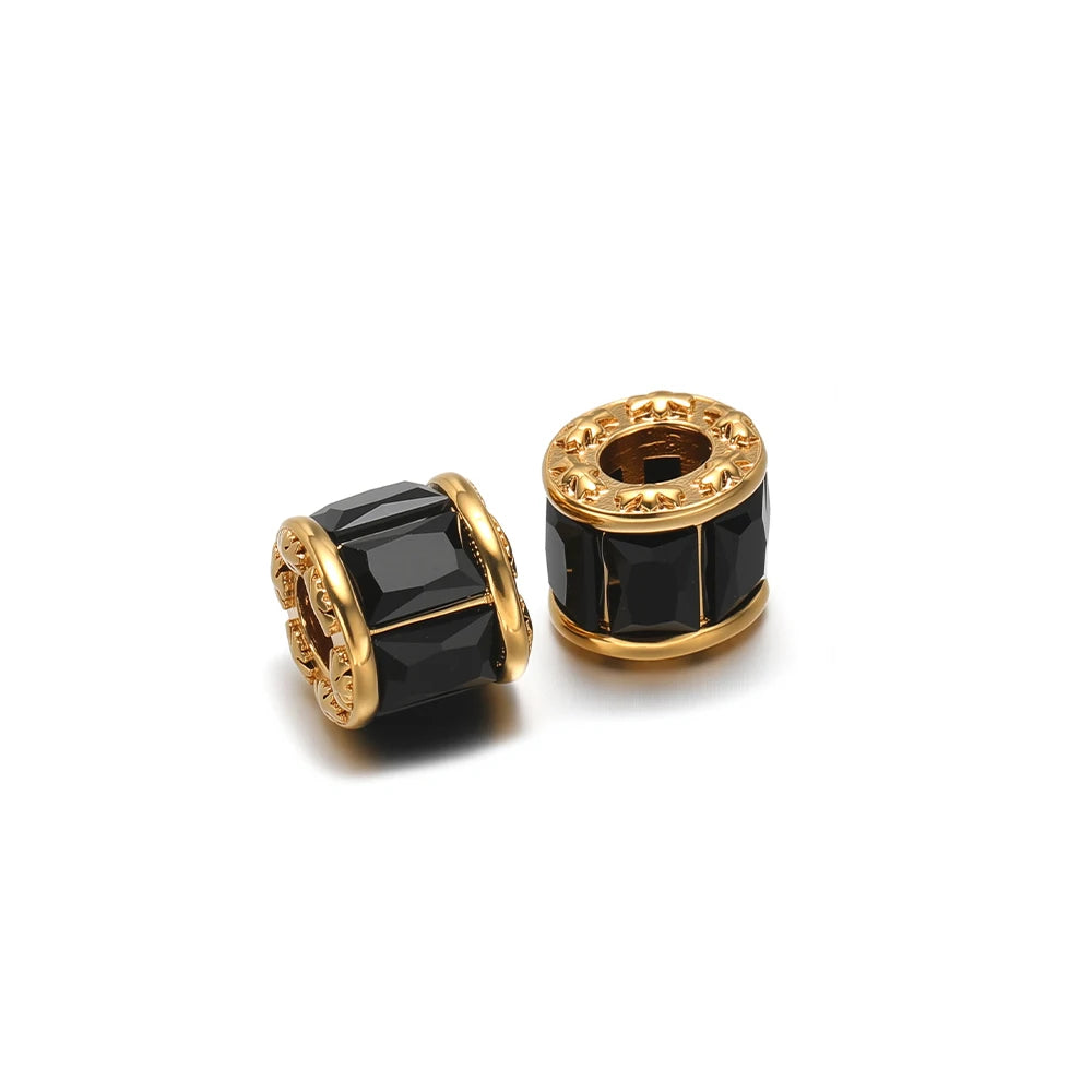 Gold-plated spacer beads with black faceted crystal and gold openwork rims