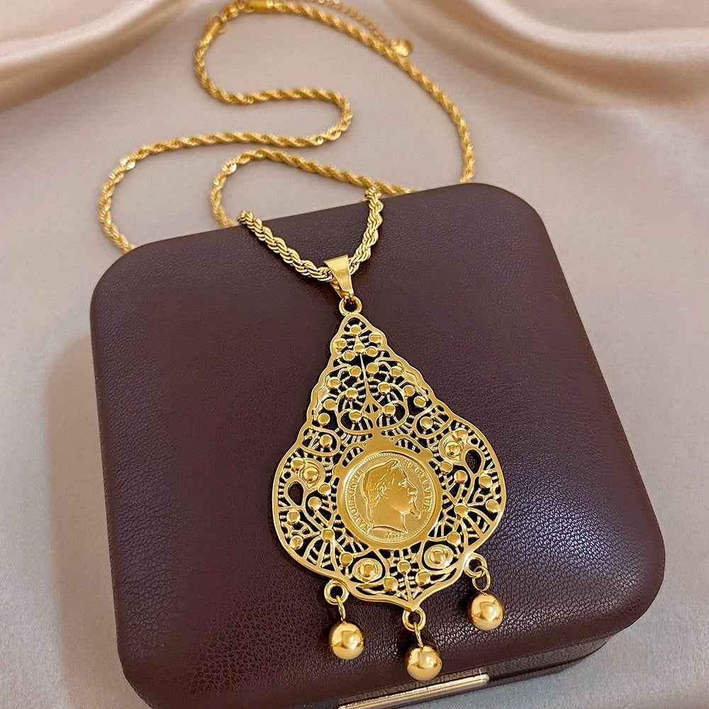 Gold-plated stainless steel necklace with teardrop filigree pendant and coin medallion, bead drops