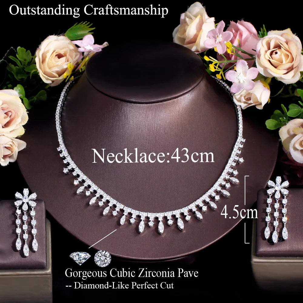Sparkling cubic zirconia necklace set on display, with matching dangling earrings