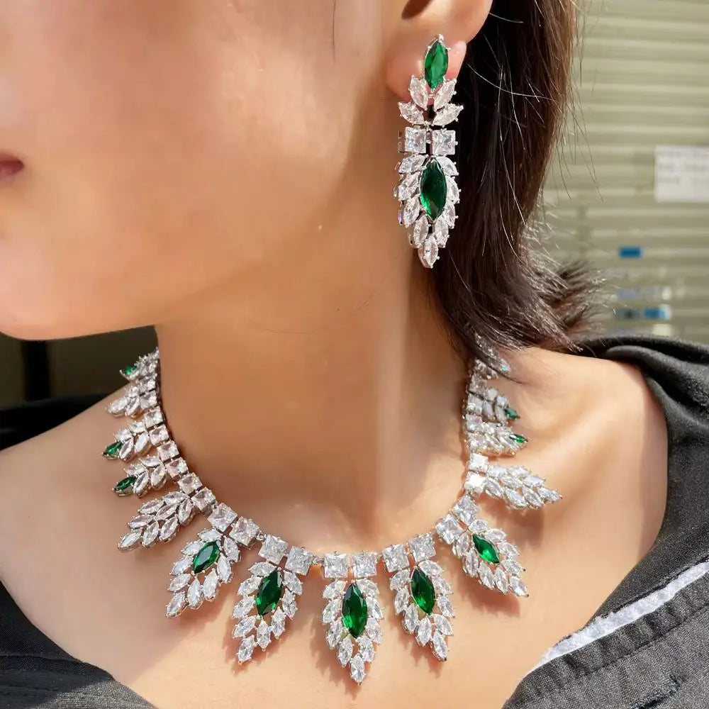 Silver leaf-style bridal set with green drop earrings and crystal leaf-drop necklace