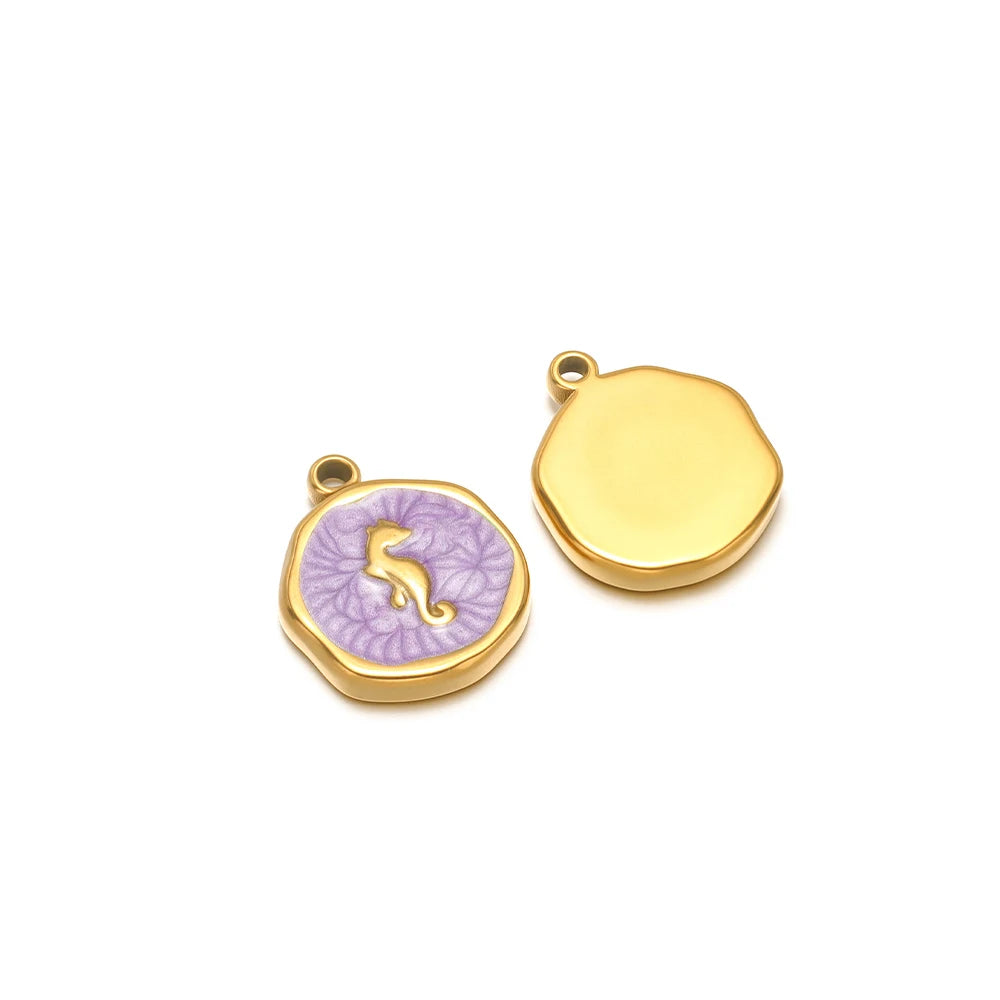 Enamel shell charm pendants, one purple with gold seahorse design and one yellow plain cap