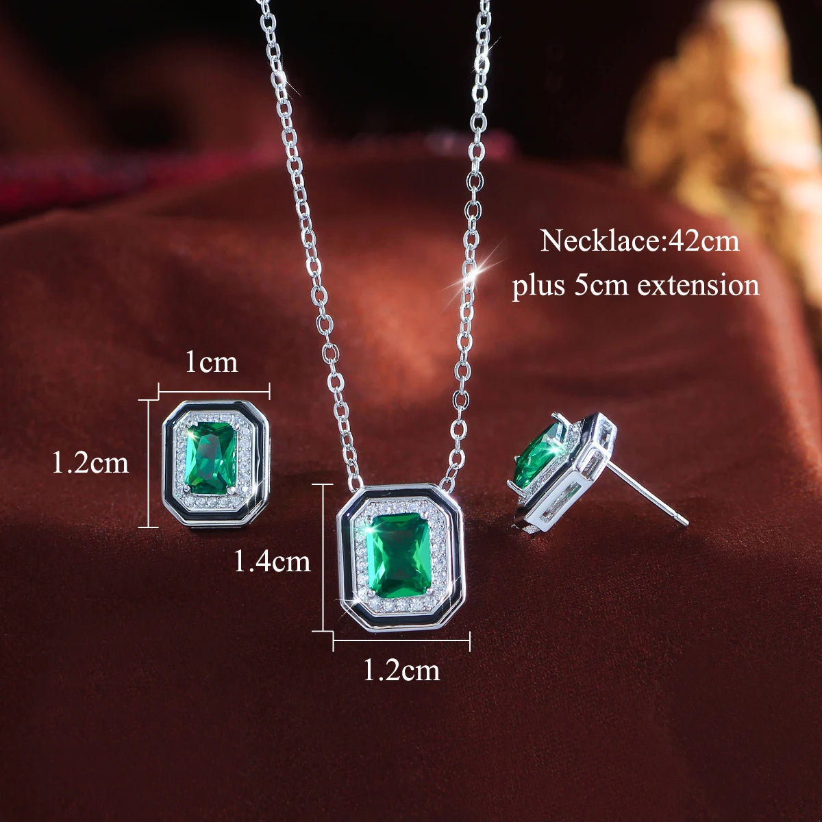 Green crystal jewelry set with a 42 cm necklace, 5 cm extender, and matching stud earrings