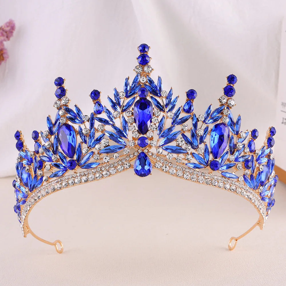 Blue crystal rhinestone tiara headband with pointed crown spikes and dangling stones