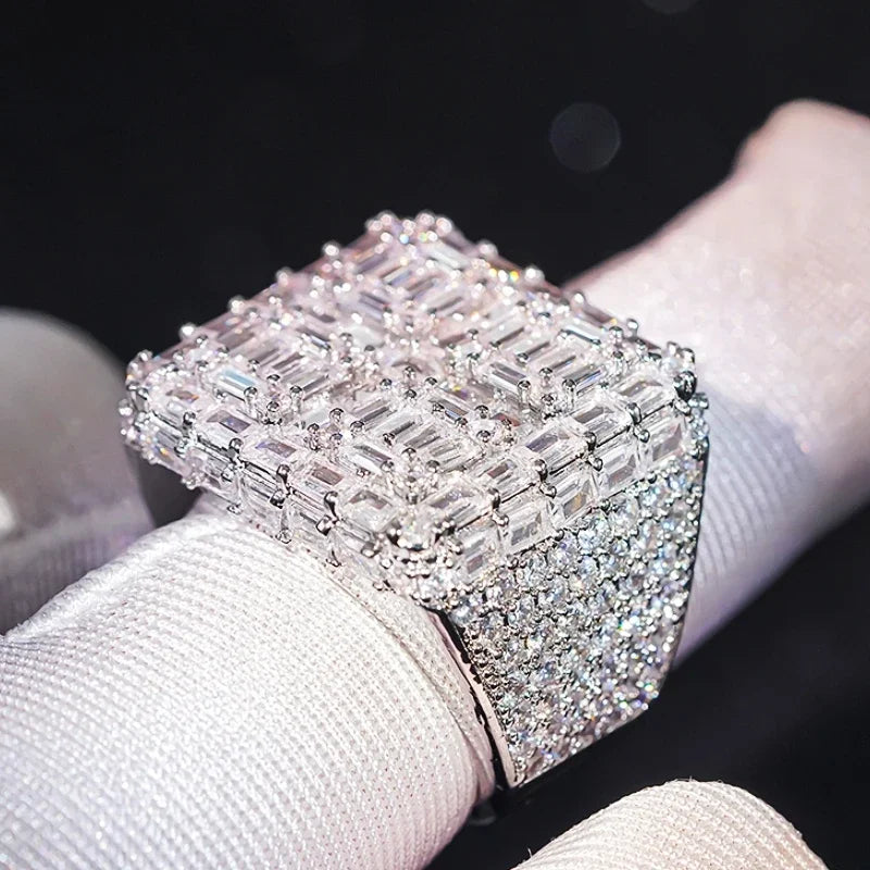 Cushion-shaped cubic zirconia ring with rectangular baguette stones, silver-tone